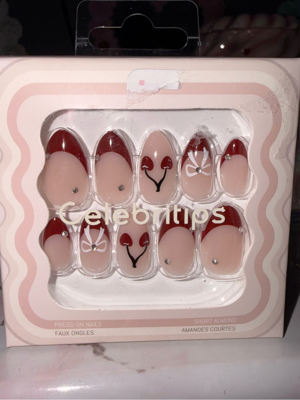 Celebritips Nude and Red Press-On Almond Nails - Cherry & Bow Accent